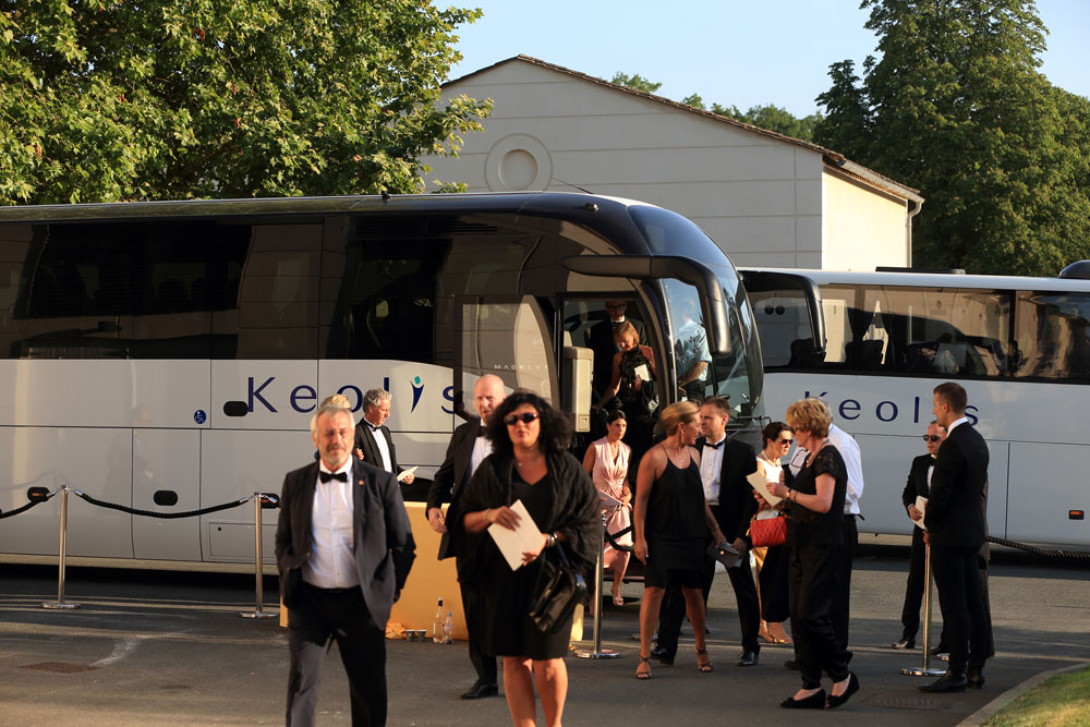 Coaches of buses for the event La Fête de la Fleur in Gironde